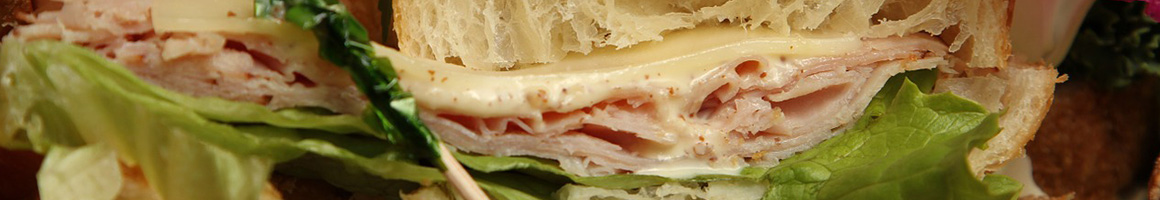 Eating Sandwich Salad Bakery at Boudin SF restaurant in Huntington Beach, CA.